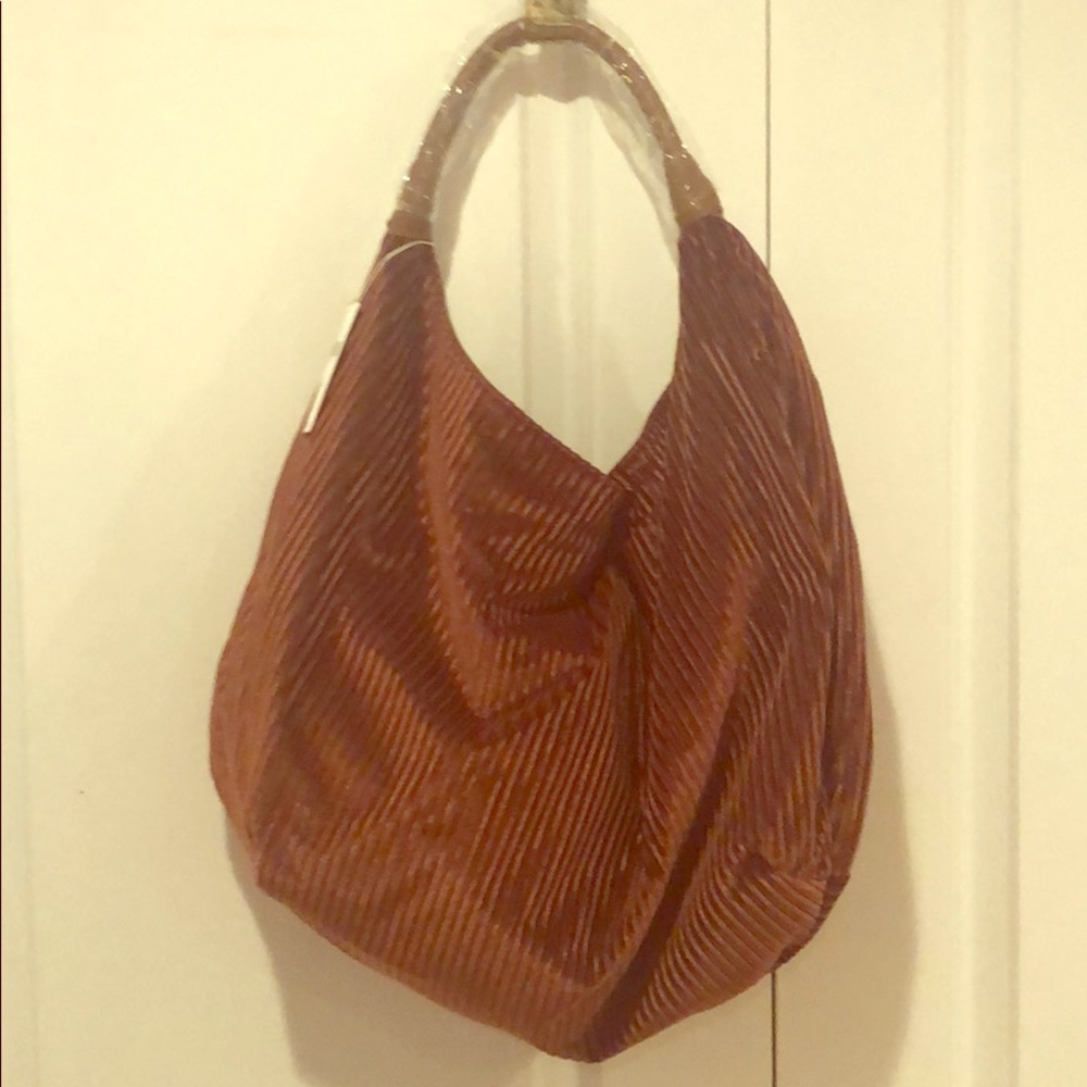 Brand new with tag Anthropologie hobo bag.